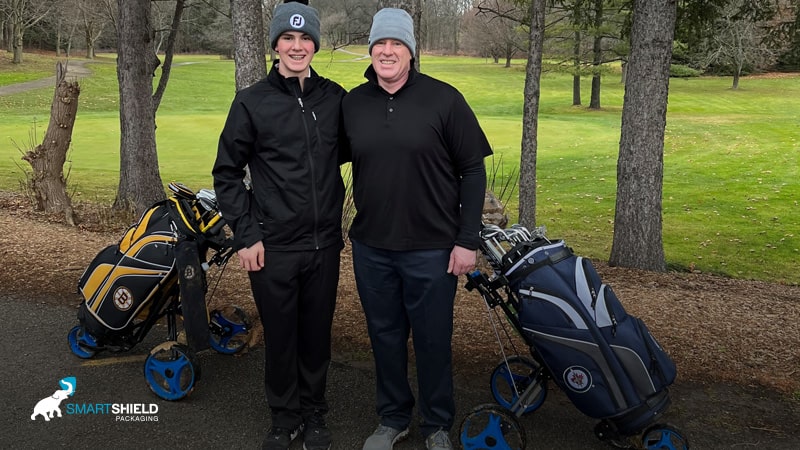 Brandon Golfing with his son