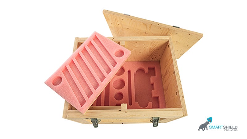 Protective foam inserts in wooden box